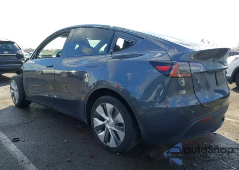 2023 Tesla Model Y Awd/Long Range Dual Motor All-Wheel Drive z USA, uszkodzony, nr VIN 7SAYGDEE2PA103779